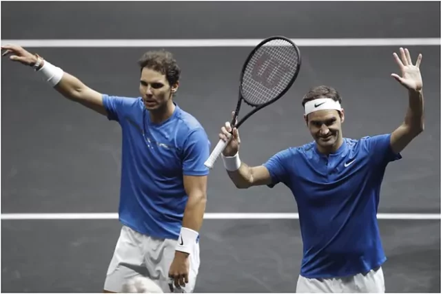 Dobles Rafa Nadal y Roger Federer en dobles este viernes.