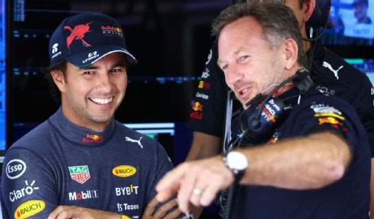 Checo Sergio Pérez y Christian Horner, durante el Gran Premio de Japón.