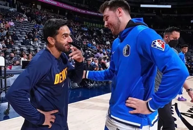 Facundo Facundo Campazzo y Luka Doncic conversan antes de un encuentro.